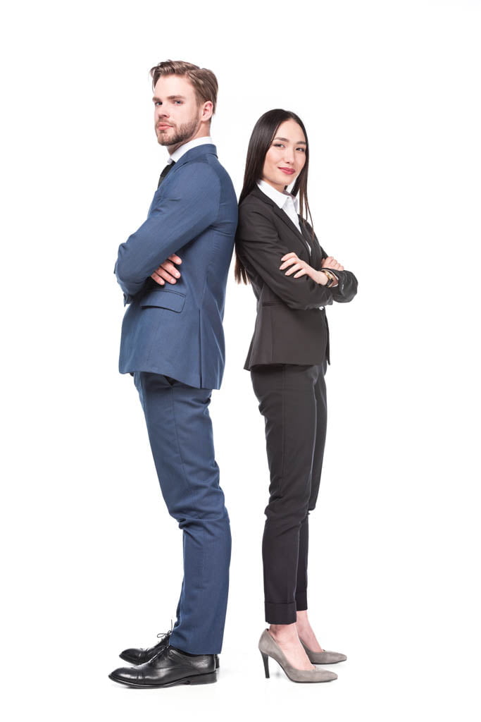 side view of multicultural business colleagues with arms crossed