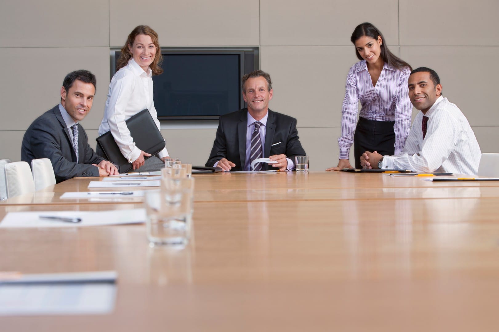 a-group-portrait-of-smiling-business-people-workin-2025-10-15-05-01-48-utc