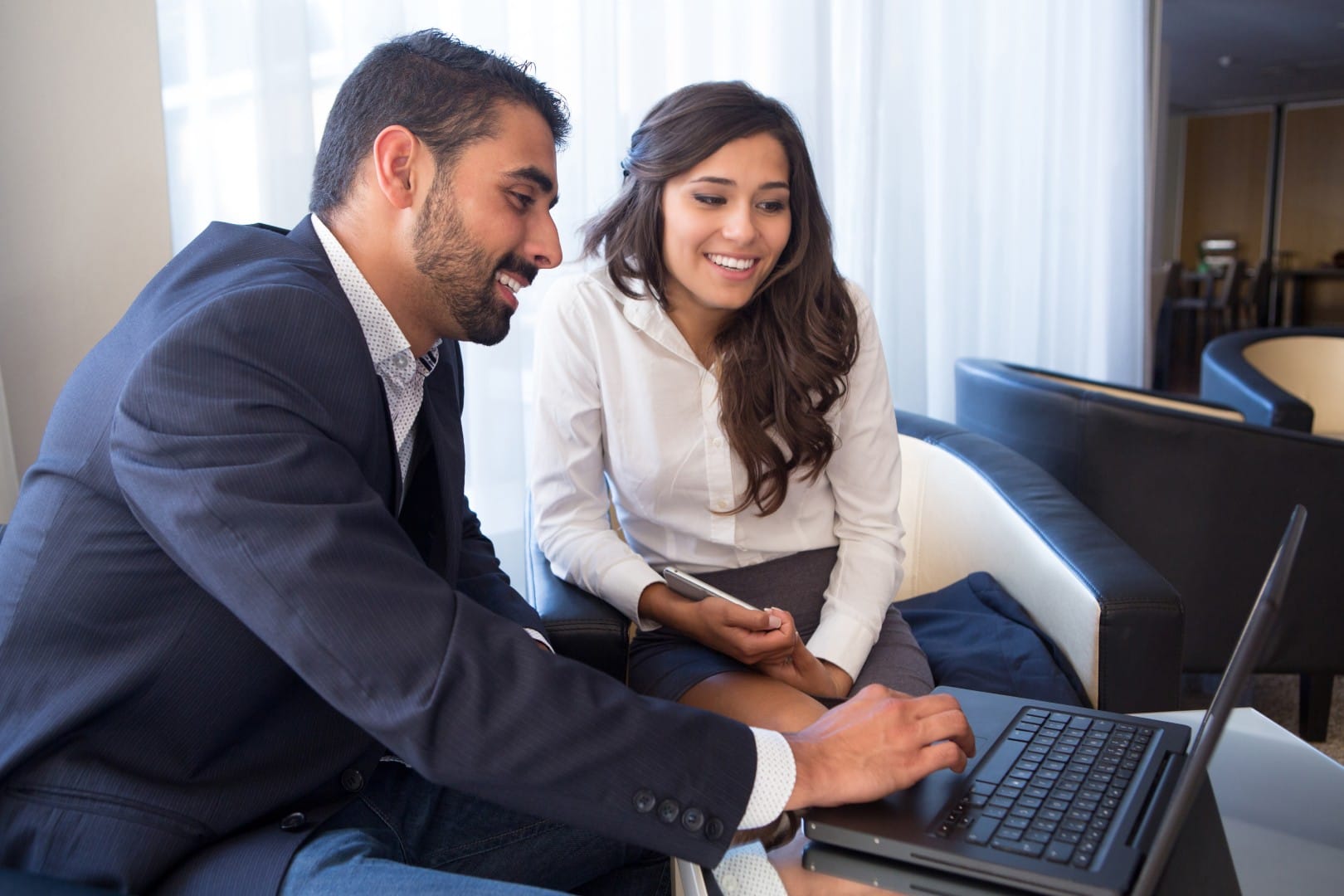 business-couple-with-computer-2024-09-23-01-33-43-utc