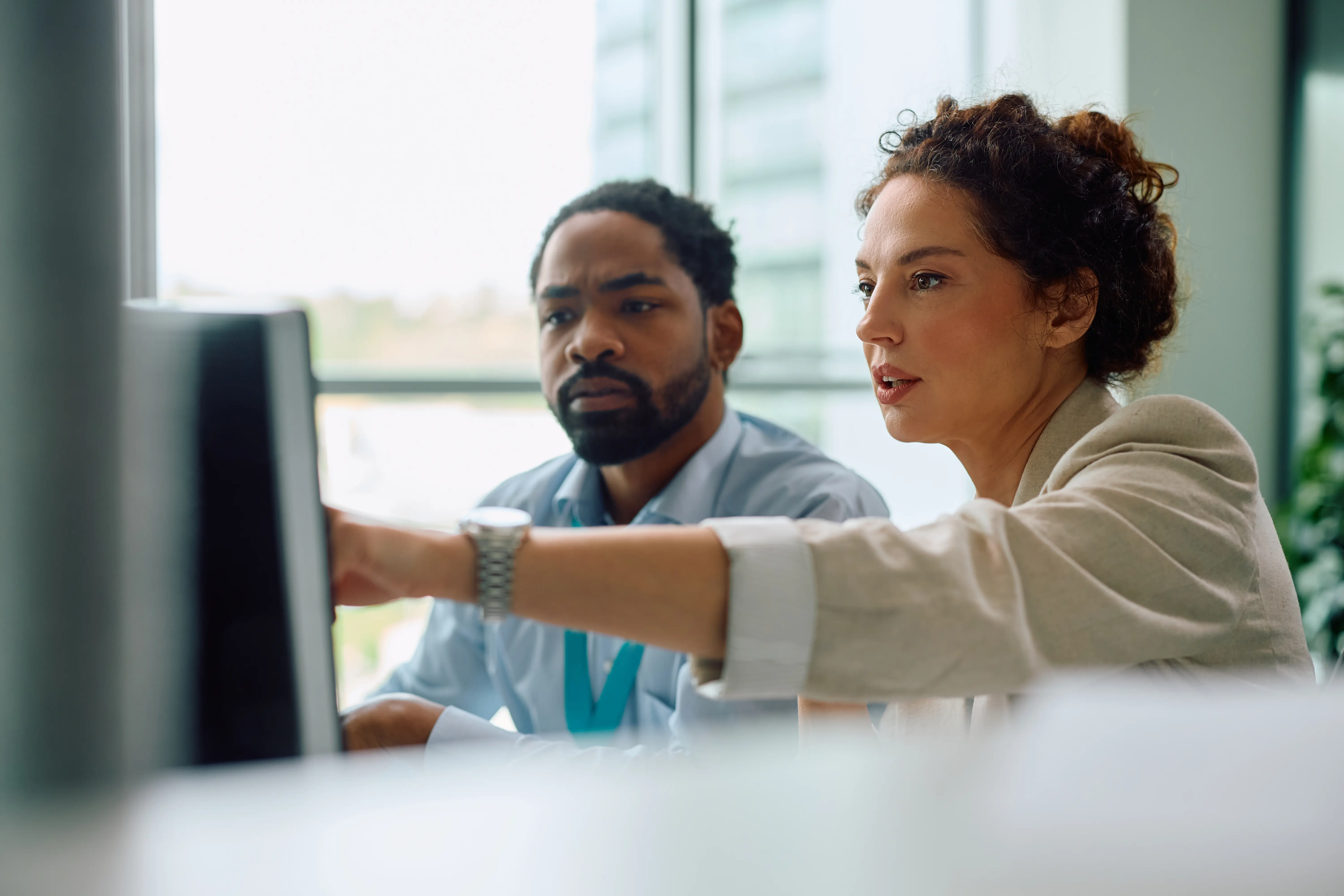 business-colleagues-cooperating-while-working-on-a-2026-01-06-10-30-00-utc